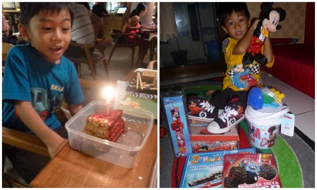 the birthday boy with his cake and presents!